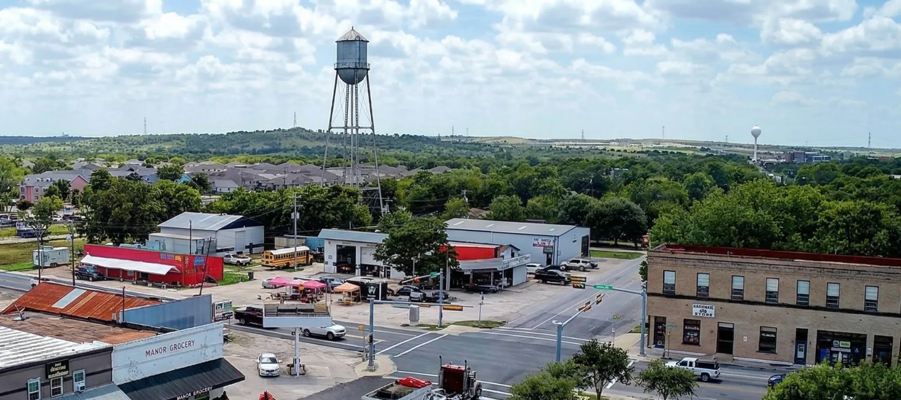 Aerial view of downtown Manor, Texas including the water tower.